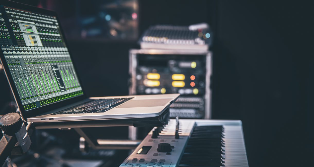 Laptop screen showing the interface of a music program for working with sound.